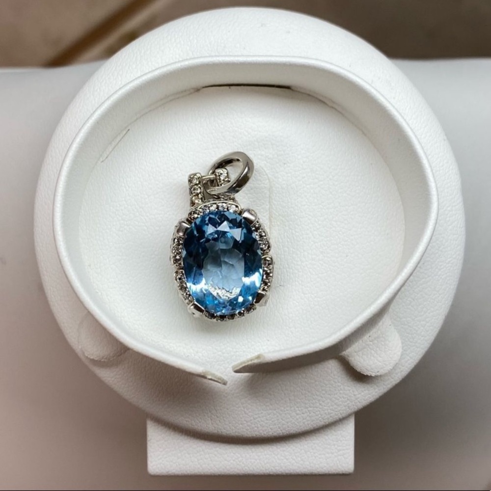 Genuine Blue Topaz 13.50CT with 1.80CTW White Topaz Sterling Silver Pendant